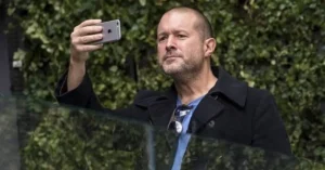 Jonathan "Jony" Ive, chief design officer for Apple Inc., uses an Apple iPhone to take a photograph of the "plaza" area during the grand opening of the company's new flagship store at Union Square in San Francisco, California, U.S. Image credit: David Paul Morris/Getty image